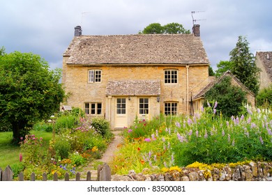 Typical House With Front Garden In The Cotswolds Of England