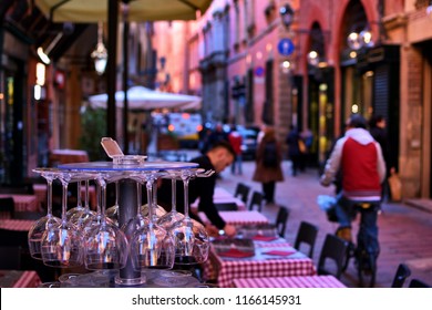 Typical Italian Restaurant Always Prepared For Guests With Couple Of Wine Glasses Outside