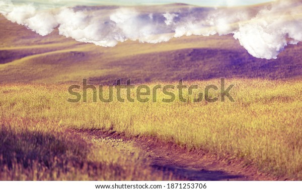 Typical\
landscape flat dry desert with small\
mountains