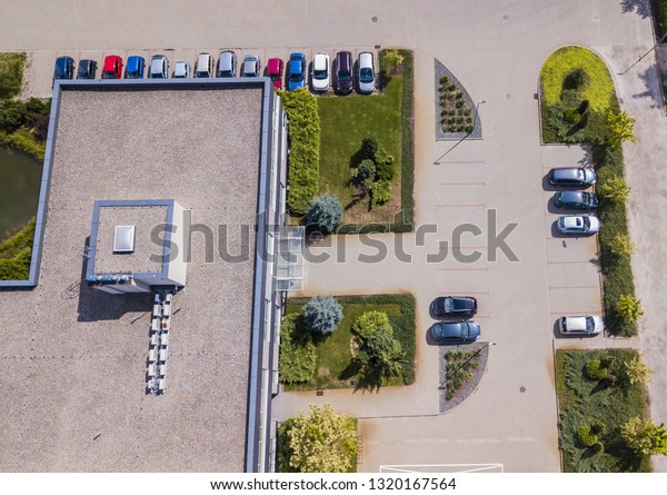 Typical light industrial and small\
business office viewed from above. Aerial to\
view