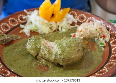 A Typical Mexican Dish Of Chicken With Mole Verde