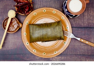 Typical Mexican food, Veracruz or jarochos tamales, prepared with banana leaves, corn flour and red adobo. Prehispanic food, that is, food prepared since before the arrival of the Spanish to America
