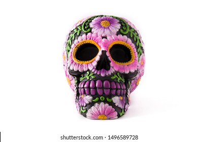 Typical Mexican skull painted isolated on white background. Dia de los muertos.