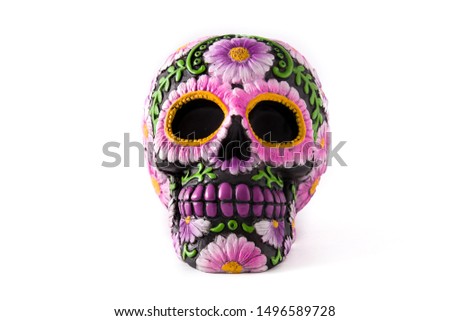 Typical Mexican skull painted isolated on white background. Dia de los muertos.