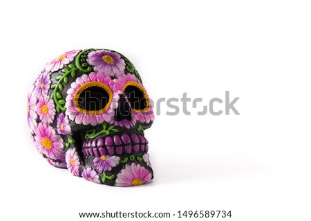 Typical Mexican skull painted isolated on white background.Copyspace. Dia de los muertos.