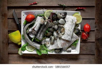 Typical Neapolitan Raw Fish Dish Of The Christmas Period With Capitone, Eel, Cod And Clams