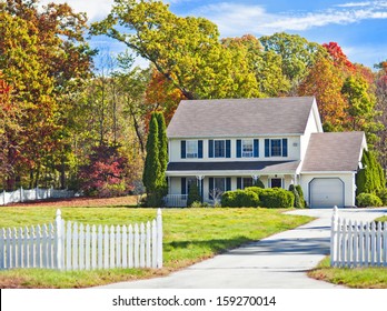 Typical New England colonial style house in the fall 