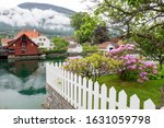Typical Norwegian wooden houses on the shores of the lake that bathes Stryn Norway