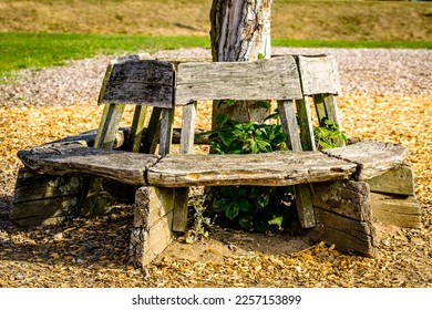 typical old wooden bench - parkbench - photo
