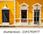 Typical old yellow house at the magical town of Izamal in Yucatan, Mexico