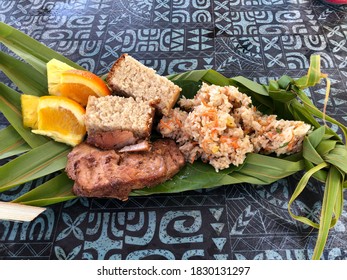 Typical Polynesian Food In Bora Bora. Banana Dish With Fruits And Fish