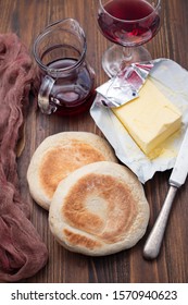 Typical Portuguese Bread Bolo Do Caco With Butter And Knife