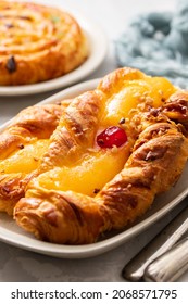 Typical Portuguese Sweet Bread With Cream On The Dish On Gray