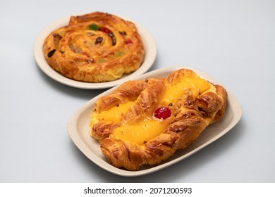 Typical Portuguese Sweet Bread With Cream On The Dish On Gray