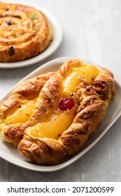 Typical Portuguese Sweet Bread With Cream On The Dish On Gray