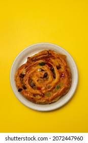 Typical Portuguese Sweet Bread With Cream On The Dish On Yellow