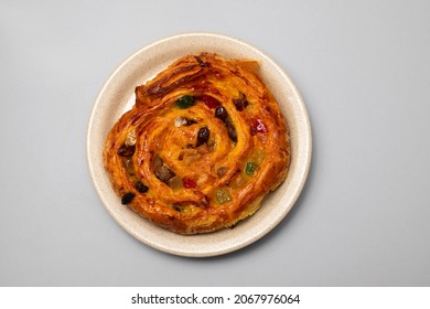 Typical Portuguese Sweet Bread On The Dish On Gray