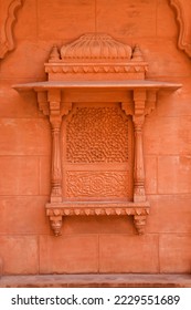 The typical Rajasthani architecture of decorative frame on a sandstone wall. - Shutterstock ID 2229551689