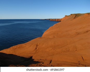 Typical Red Cliffs In Magdalene Islands, Iles De La Madeleine, Quebec, Canada