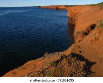 Typical Red Sandstone And Clay Cliffs In Magdalene Islands, Iles De La Madeleine, Quebec, Canada