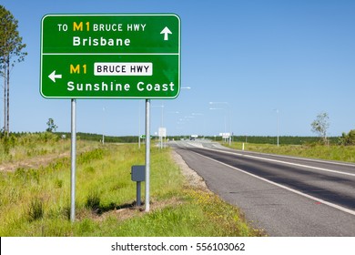 A Typical Road Sign In Queensland Australia, Giving Directions To The On Ramps To The Bruce Highway For Drivers To Head South To Brisbane Or North To The Sunshine Coast.