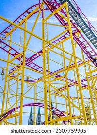typical roller coaster in front of blue sky - photo