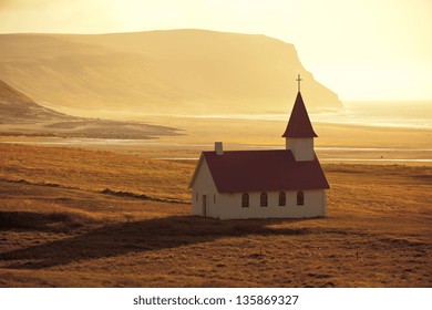 Typical Rural Icelandic Church at Sea Coastline. Horizontal shot