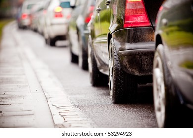 Typical Scene During Rush Hour. A Traffic Jam With Rows Of Cars. Shallow Depth Of Field.