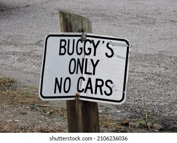 A typical sign for Amish country. Buggies have their own parking area