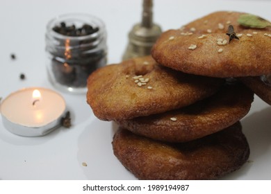 A Typical South Indian Sweet 
Arisalu In Telugu
Kajjaya In Kannada
Usually Made In Every House Hold On A Festival Called Sankranti