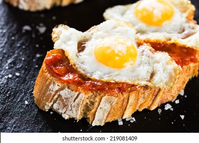 Typical Spanish Food Tapas: Quail Eggs And Sobrada Of Mallorca