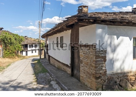 Typical street and old houses at historical village of Staro Stefanovo, Lovech region, Bulgaria