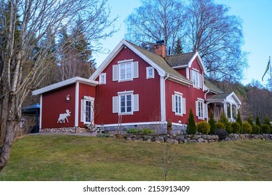 Typical Swedish falu red house with white windows