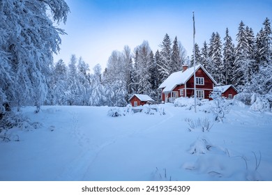 A typical Swedish red cabin in a snowy winter wonderland, set under a blue sky, with lights in the windows casting a cozy, warm glow. - Powered by Shutterstock