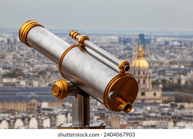 Typical telescope on the Eiffel tower provides great views of the Paris skyline - Powered by Shutterstock