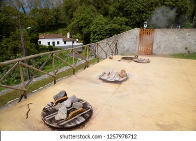 Typical And Traditional Azores Food Dish Or Dinner Prepared By Lowering The Pot In A Hot Spring Hole Heated By Volcanic Steam For More Than 5 Hours, Slow Cooking With A Lid Weighted With Stones On Top