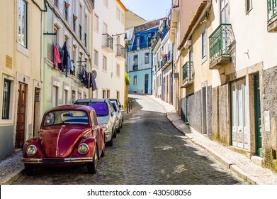 Typical Traditional Portuguese Street With Old Classic Vintage Beetle Car In Lisbon, Portugal