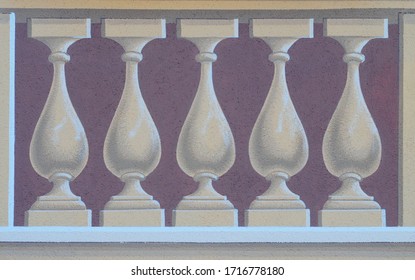 Typical trompe-l'oeil or paintery illusion of five cream pillars on purple background on exterior of building of historical significance in Liguria, Italy