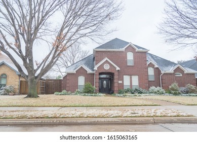 Typical Two Story House Under Winter Snow Cover Near Dallas, Texas, USA