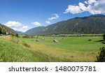 typical tyrolean landscape with fresh grass and bright meadows at Tarrenz, Austria