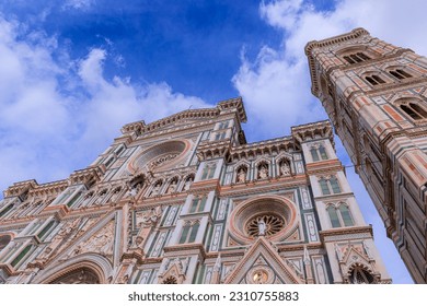 Typical urban view of Florence: the main facade of Cathedral of Santa Maria del Fiore with Giotto's Bell Tower, Italy. - Shutterstock ID 2310755883