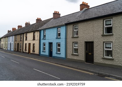 A Typical View Of A Irish Living Street And Houses.  Housing For The Normal Irish People.  Houses Or Homes In Ireland.  View On Living Street In Ireland.  Coloured Home's Houses.