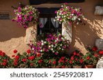 typical window with flowers, Corconte village, Ebro reservoir, Cantabria-Burgos, Spain