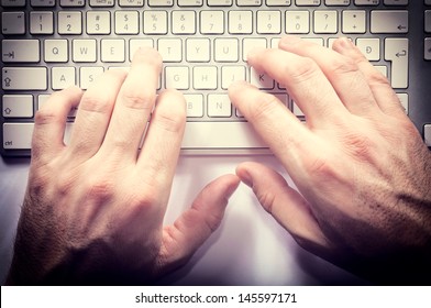 Typing Hands On The Keyboard From Above 