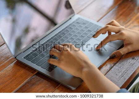 Typing keybord on the table with softlight.