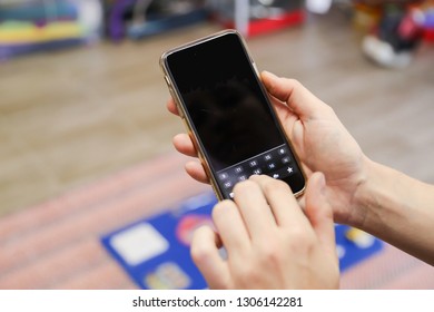 Typing On A Celphone In The Office 