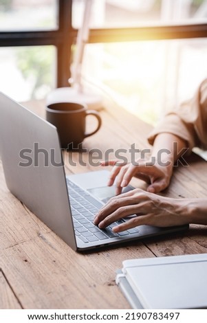 Typing on a tablet computer in a modern office. Make an account analysis report. real estate investment information financial and tax system concepts