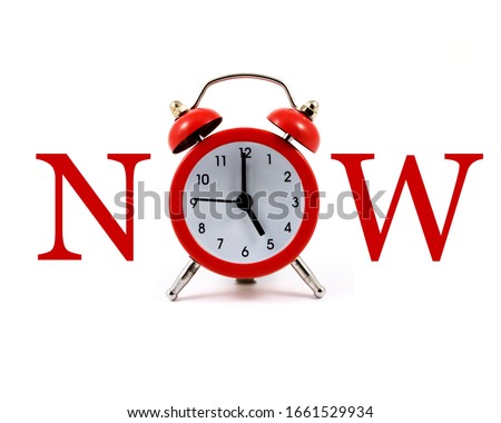 A typographic image spelling out the word Now using a red alarm clock.