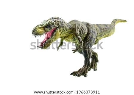 Tyrannosaurus Rex figurine isolated on white. Side view of a fierce T-Rex dinosaur. Tyrannosaurus was a bipedal carnivore with a massive skull. Exist before the Cretaceous-Paleogene extinction event.