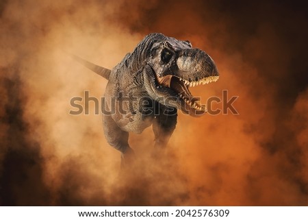 Tyrannosaurus T-rex ,dinosaur on smoke background
